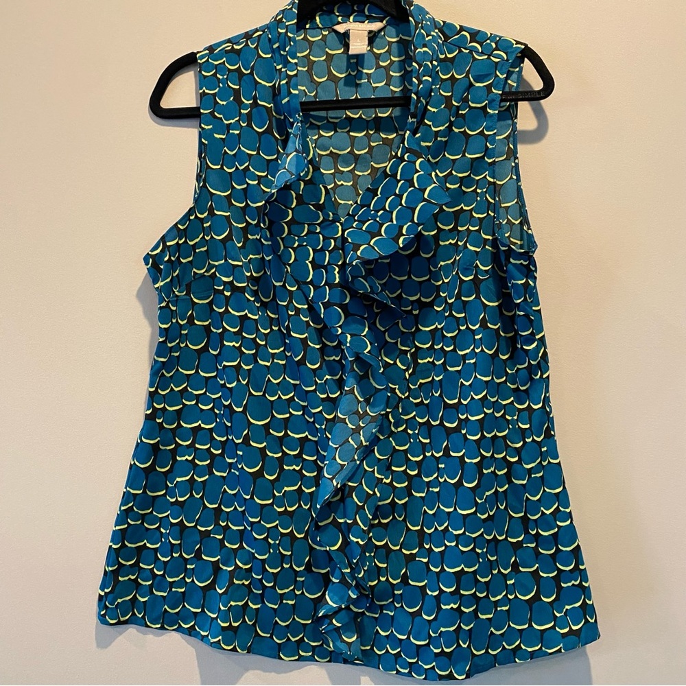Banana Republic sleeveless, v-neck, print shirt with ruffle accent in front